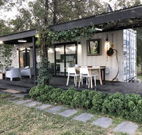 Absolute riverfront shipping container cabin - Taree Accommodation