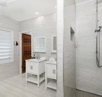 Bathers across the bay from Port Douglas - Taree Accommodation